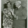 New York World's Fair - Employees - Gibson, Harvey (Chairman of Board) - With woman, holding tickets