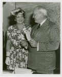 New York World's Fair - Employees - Gibson, Harvey (Chairman of Board) - With woman, holding tickets