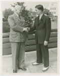 New York World's Fair - Employees - Gibson, Harvey (Chairman of Board) - Shaking hands with boy