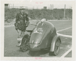 New York World's Fair - Employees - Police - Policeman in uniform standing next to motorcycle