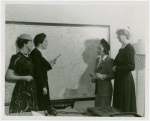 New York World's Fair - National Advisory Committees - Women's Participation - Group at map