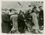 New York World's Fair - National Advisory Committees - Women's Participation - Women getting off airplane greeted by Fiorello LaGuardia, Harvey Gibson and Mrs. Oswald B. Lord