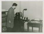 New York World's Fair - Offices at Work Exhibit - Printing - Employee at mimeograph machine