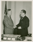North Carolina Participation - W.E. Fenner shaking hands with Grover Whalen