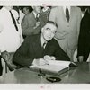 North Dakota Day - John Moses (Governor) signs guestbook