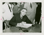 North Dakota Day - John Moses (Governor) signs guestbook