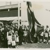 Norway Participation - Raising flag in front of building