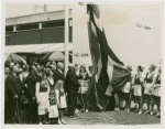 Norway Participation - Raising flag in front of building