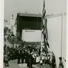 Norway Participation - Raising flag in front of building