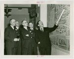 Grover Whalen showing plan to members of Oregon's National Advisory Committee