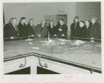 Ohio - Commission members and Grover Whalen looking at model
