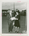 Ohio - Harold Burton (Cleveland mayor) and woman with good-will packet