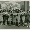 Opening Day - 1940 Season - Group holding ""Hello Folks"" label