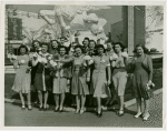 Opening Day - 1940 Season - Group holding ""Hello Folks"" label