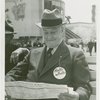 Opening Day - 1940 Season - Man on bench looking at itinerary