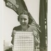 Woman holding Pittsburgh Plate Glass Co. Estimator of Attendance