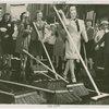 Parades - Street Cleaning - Women sweep street