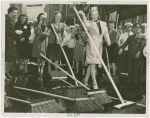 Parades - Street Cleaning - Women sweep street