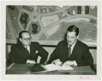 Peru Participation - Pardo de Zela (Consul General) and Grover Whalen sign contract