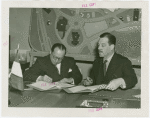 Peru Participation - Pardo de Zela (Consul General) and Grover Whalen sign contract