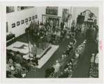 Peru Participation - Building and Exhibits - Man speaking to crowd at exhibit