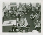 Peru Participation - Building and Exhibits - Man speaking to crowd at exhibit
