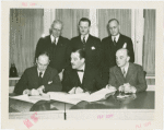 Poland Participation - Baron Stefan Ropp (High Commissioner) and Grover Whalen sign contracts