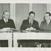 Poland Participation - Grover Whalen, Antoni Milkowski (Assistant Commissioner) and Count Janusz Illinski (former Military Attache) sign contracts