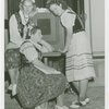 Poland Participation - Women in traditional dress listen to radio