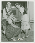 Poland Participation - Women in traditional dress listen to radio