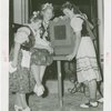 Poland Participation - Women in traditional dress listen to radio