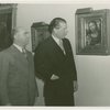 Poland Participation - Officials look at painting