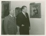 Poland Participation - Officials look at painting