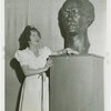 Poland Participation - Hostess in Polish Tea Room and bust of Paderewski