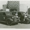 Poland Participation - Women in traditional dress sitting on ambulances