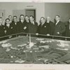 Portugal Participation - Grover Whalen, Aragao Barros (Deputy Consul), J. Saavedra de Figueiredo (Vice Consul), Joao de Bianchi, Antonio Ferro (Commissioner General), Victor Verdades (Consul General) and staff look at model