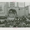 Portugal Participation - Women in traditional dress and audience in front of building