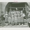 Portugal Participation - Women in traditional dress officials, and Grover Whalen speaking in front of building