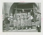 Portugal Participation - Women in traditional dress officials, and Grover Whalen speaking in front of building