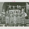 Portugal Participation - Women in traditional dress officials, and Grover Whalen speaking in front of building