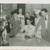 Portugal Participation - Joao de Bianchi signs guestbook while officials look on