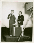 Press Events - National Press Club - Two men talking while being filmed for television