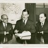 Puerto Rico Participation - Grover Whalen, Fenrnando J. Geigel (Director of Agriculture and Commerce) and Jose Matienzo signing contracts