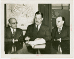 Puerto Rico Participation - Grover Whalen, Fenrnando J. Geigel (Director of Agriculture and Commerce) and Jose Matienzo signing contracts