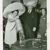 Puerto Rico Participation - Grover Whalen and woman pouring water into fountain