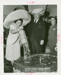 Puerto Rico Participation - Grover Whalen and woman pouring water into fountain