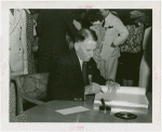 Puerto Rico Participation - Blanton Winship (Governor General) signing guest register