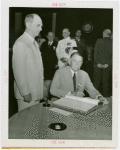 Puerto Rico Participation - Blanton Winship (Governor General) signing guest register