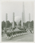 Pylons - Members of the military march in front of Four Elements pylons