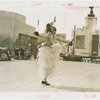 Queens, Borough of - Woman dancing during Queens Week